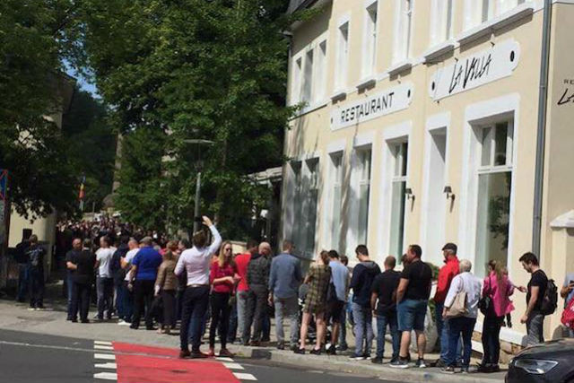 Hundreds of Romanians are pictured queuing to vote at the Romanian embassy in Luxembourg on 27 May 2019 Adina Barbu