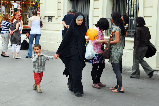 Illustration photo shows a woman walking down a street wearing a hijab in Marseille, France Shutterstock