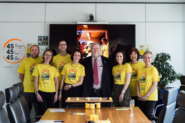 Irish ambassador Stephen Dawson surrounded by representatives of Darkness Into Light Luxembourg, SOS Détresse, D'Ligue’s prevention suicide service and Kanner-Jugendtelefon in the offices of Centralis at the launch event on Wednesday. Mike Zenari