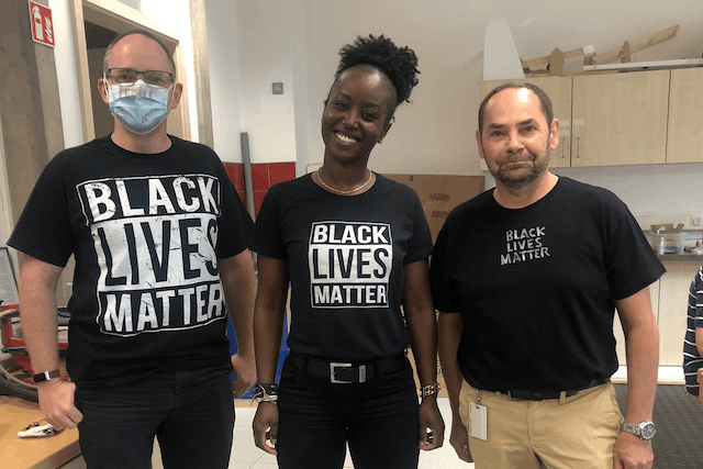 ISL English and French teacher Doline Ndorimana is pictured, centre, wearing a Black Lives Matter T-shirt, which she will wear for work every Thursday until the end of the school year Doline Ndorimana/Twitter