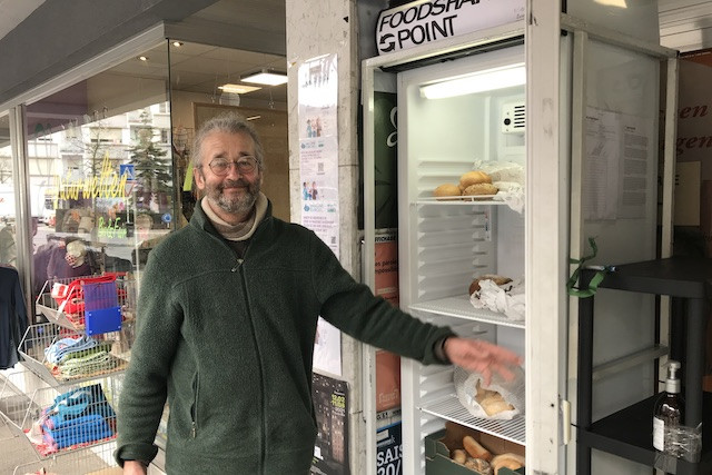 Lucien Reger is pictured beside the Foodsharing fridge outside his shop in Bonnevoie Delano