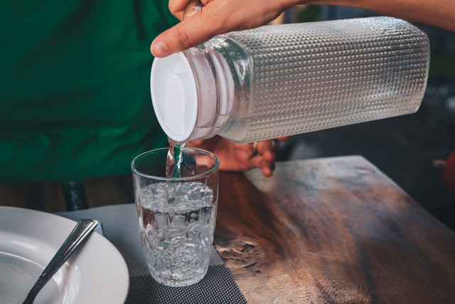 The government will launch an awareness campaign about the quality of drinking water and encourage restaurants to provide a pitcher of tap water to diners. Legislation may follow depending on the success of the campaign. Shutterstock