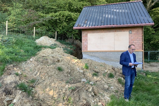 Robert Traversini photographed in September on the land on which he carried out work on a garden house without authorisation. He has since resigned as mayor of Differdange and as an MP. Paperjam