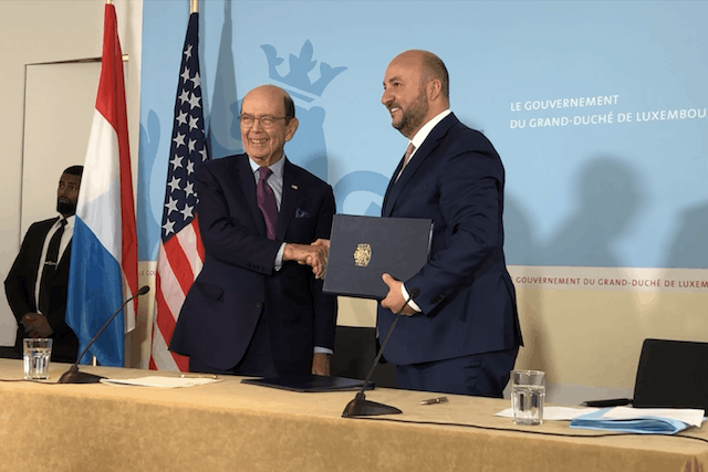 US secretary of commerce Wilbur Ross and Luxembourg deputy PM Etienne Schneider shaking hands following the signing of the MoU Delano