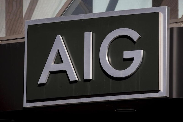 The AIG logo is seen at its building in New York’s financial district on 19 March 2015 Reuters/Brendan McDermid