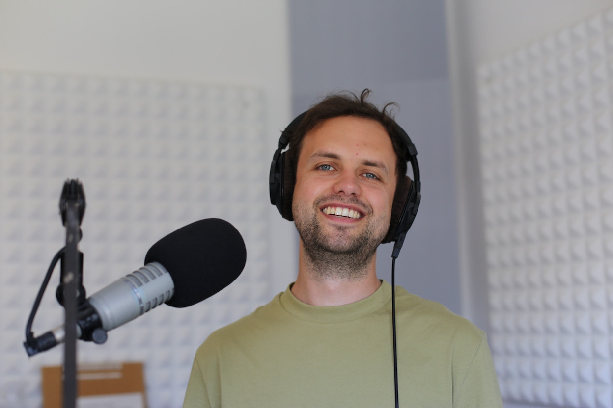 Breakfast show host Tom Clarke in the Ara City Radio studios Ara City Radio
