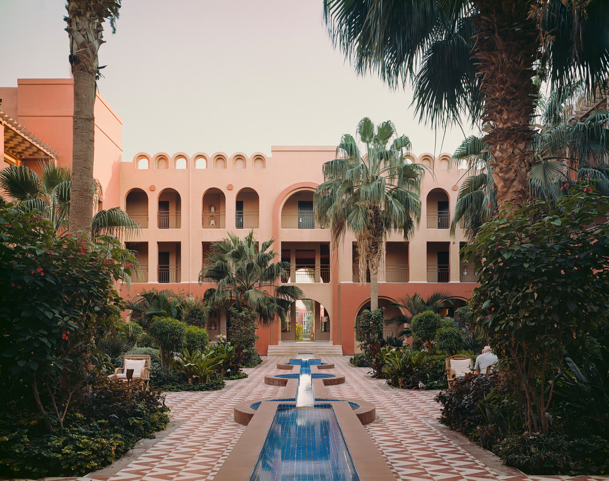 The courtyard at the  Three Corners Ocean View Hotel  offers a small sanctuary in the heart of the hotel with places to pause, meet, or enjoy a moment alone.  Simon Menges & Nino Tugushi