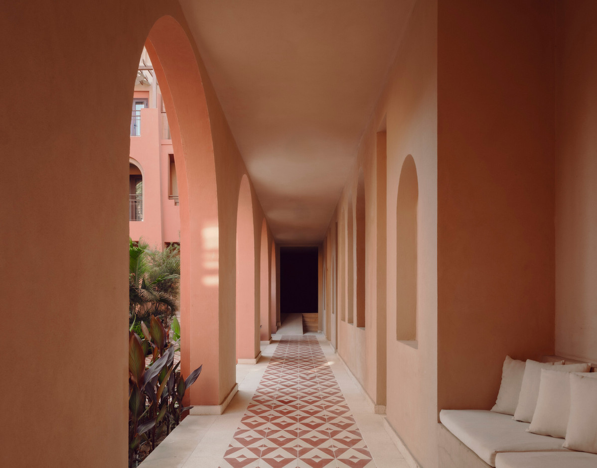 For the corridor at the  Three Corners Ocean View Hotel , arches break the length, giving the corridor a rhythm, a sense of intervals.  Simon Menges & Nino Tugushi