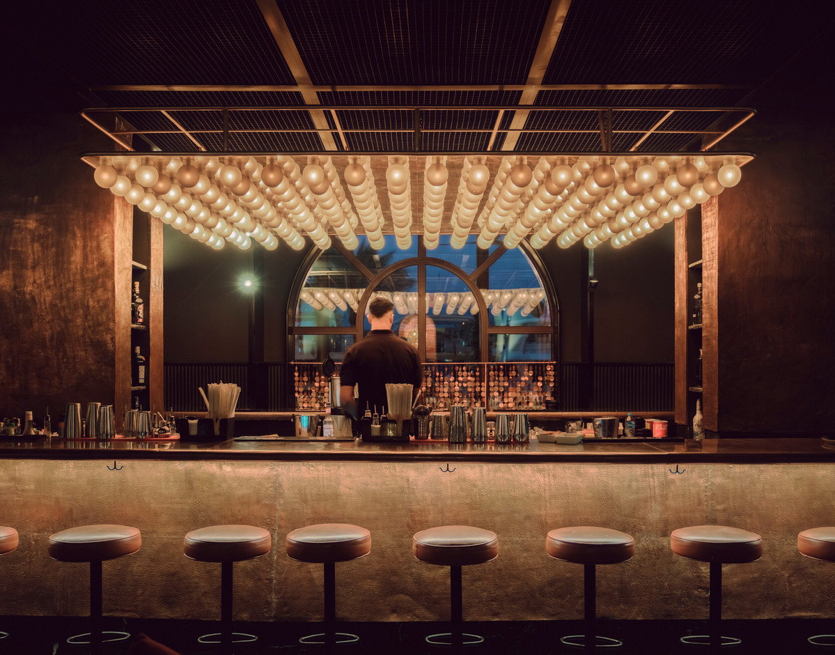 Back to the  Three Corners Ocean View Hote l, AP refurbished the hotel night club, Peanuts. including a custom marquee light fixture for the bar composed of 192 locally hand-blown lightbulbs.  Simon Menges & Nino Tugushi