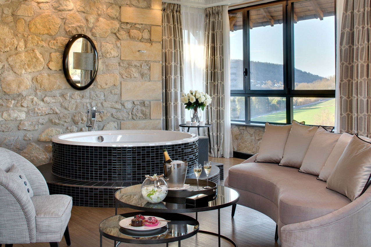 The exclusive panoramic suite Simone is built on top of the Domaine’s tower and includes a whirlpool bath. Photo: Domaine de la Klauss/Jerome Mondiere