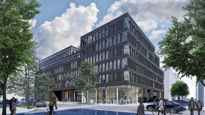 La partie bureaux présente une façade foncée, avec un haut socle vitré. ((Illustration: QuickIT_Steinmetzdemeyer))