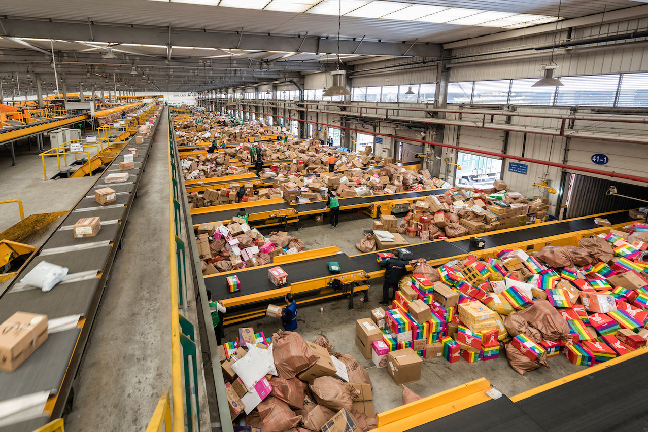 Chengdu, Sichuan, China, 6 January 2019: China Post automates a big part of its delivery services in a warehouse in Chengdu, China. Photo: Shutterstock