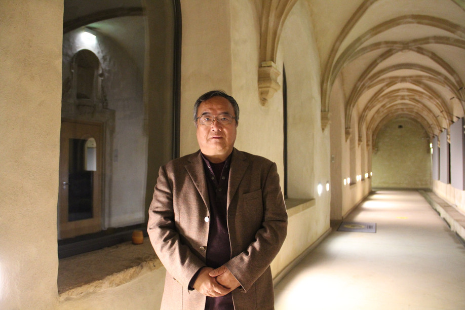 Prof Gyal Lo, a Tibetan activist, pictured at Neumünster abbey where he held a talk on what he describes as a colonial boarding school system in Tibet. Photo credit: Amis du Tibet
