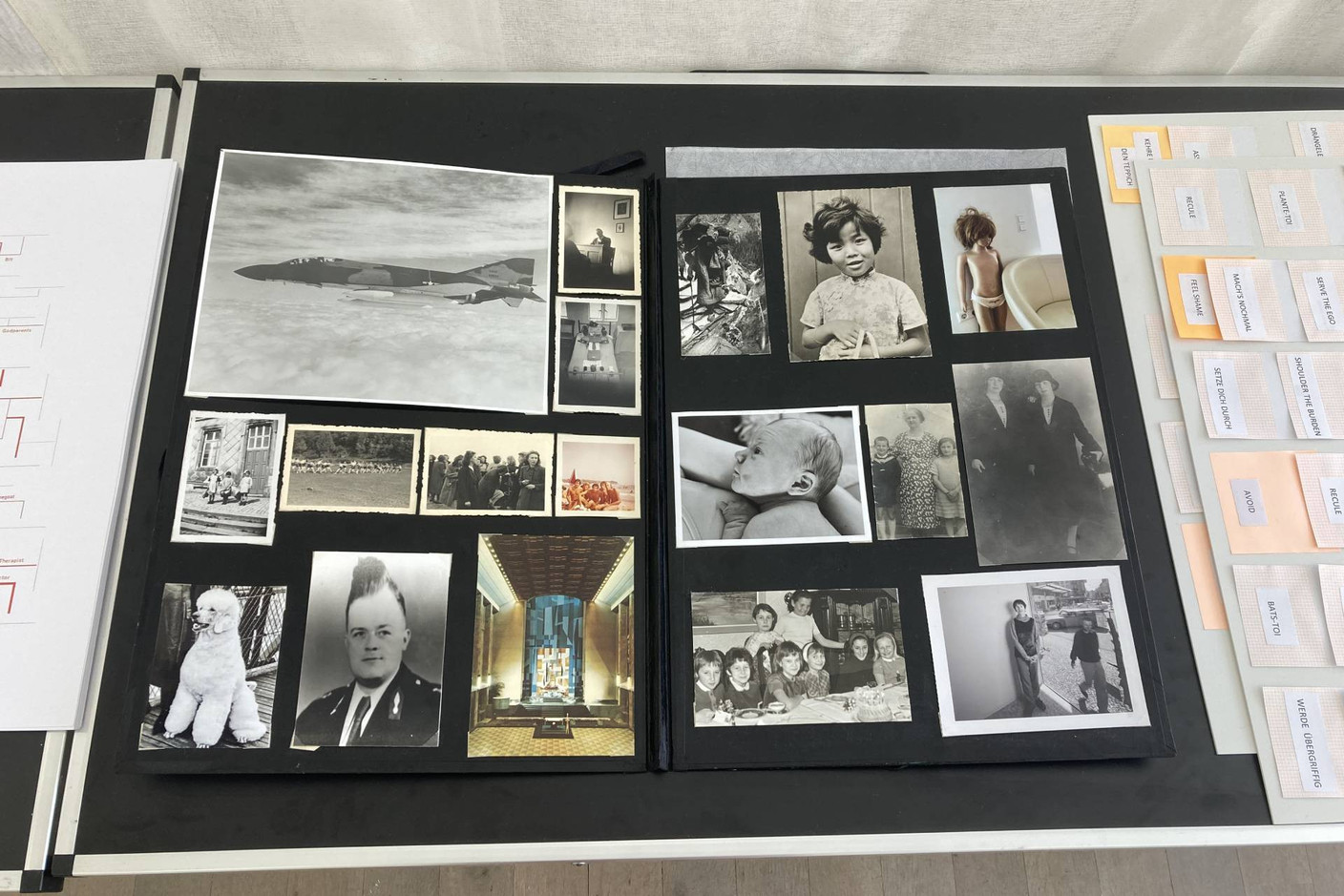 This game board is a collection of intriguing photos, presented as if in a family album.  Photo: Céline Coubray