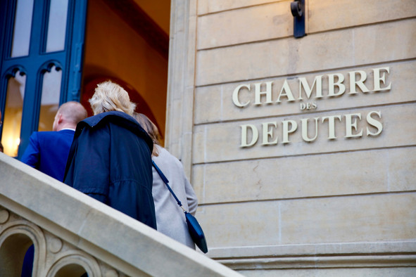 People enter Luxembourg's Chamber of Deputies, where MPs are due to vote on family benefits, immigration and civil-service reforms during the week of 12 October. Paperjam archives