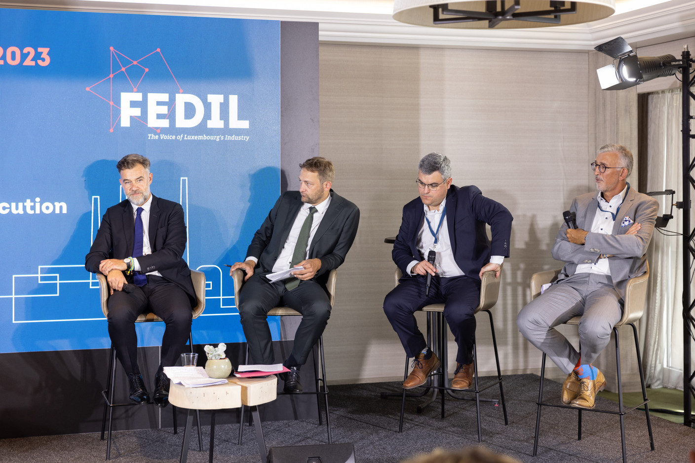 Franz Fayot, Minister of the Economy, Christophe Hansen, Member of the European Parliament, Pierre Laffont, Director, EU Affairs, France Industrie, et Georges Rassel, Vice-Chair, FEDIL. (Photo: Romain Gamba/Maison Moderne)