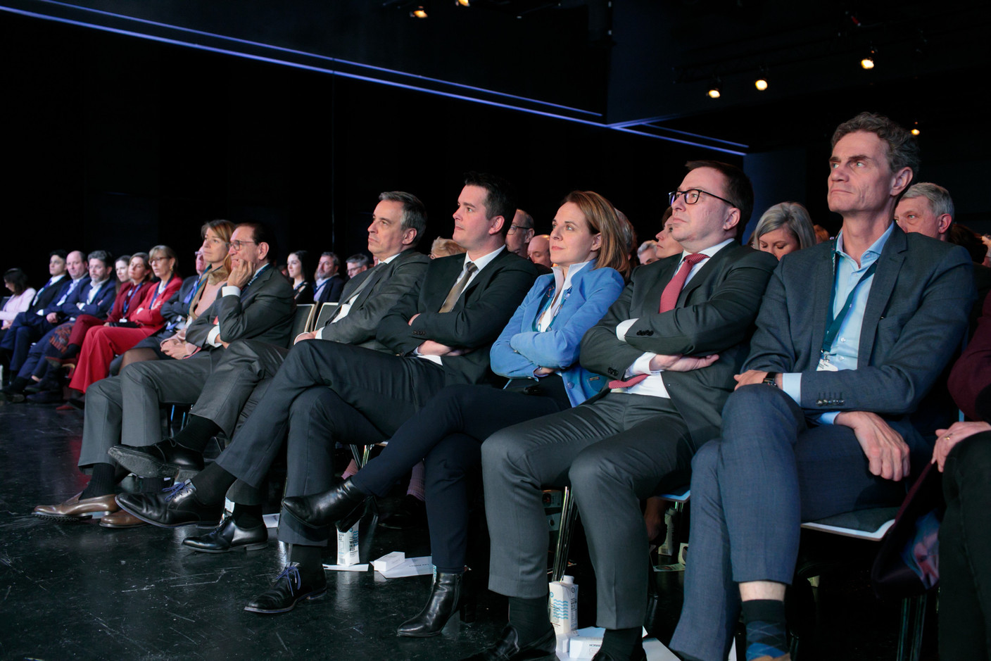Les ministres Claude Meisch, Lex Delles et Corinne Cahen lors du discours du Premier ministre Xavier Bettel. (Photo: Matic Zorman/Maison Moderne)