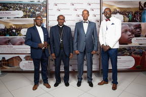 Abbé Pierre Habarurema, bishop Edouard Sinayobye and ambassador Dieudonné Sebashongore (second from right) © claude piscitelli