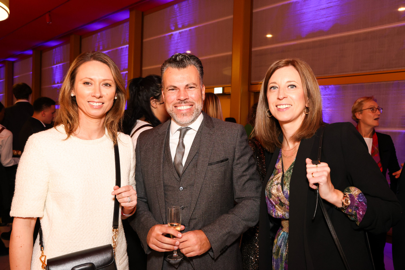 Geoffrey Dezoppy (Avaloq), centre, and Emilie Hoël-Serrurier (Banque Internationale à Luxembourg), on the right, at the 2023 Finance Awards, which took place on Tuesday 21 November 2023 at Casino 2000 in Mondorf. Photo: Eva Krins and Marie Russillo/Maison Moderne