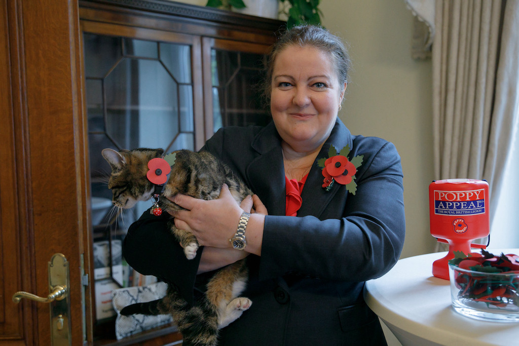 British ambassador Fleur Thomas, pictured with her cat Millie, was also celebrating the centenary of the British Legion and the Poppy Appeal. Matic Zorman/Maison Moderne