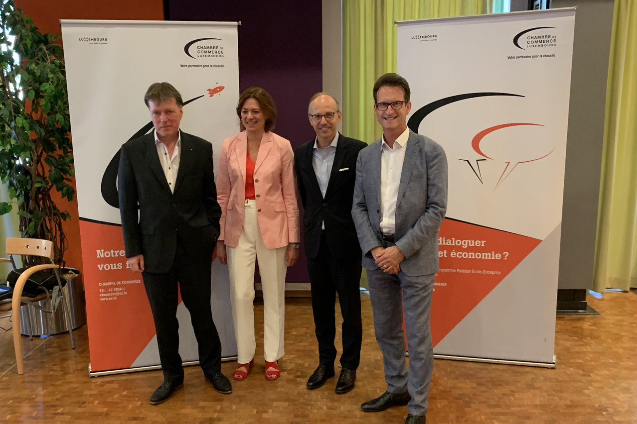 De gauche à droite: Luc Henzig, Valérie Massin, Luc Frieden et Carlo Thelen, lors de la conférence de presse du 2 juillet au Lycée technique de Bonnevoie. (Photo: Maison Moderne)