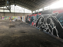 Pendant trois jours, un hall désaffecté sert d’atelier aux graffeurs. ((Photo: Paperjam))