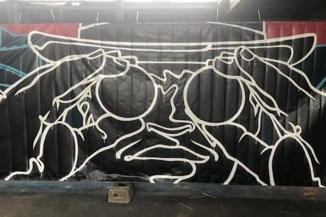 Dans un atelier à Bridel, les artistes dessinent sur des bâches de chantier pour la Cloche d’Or. (Photo: Paperjam)