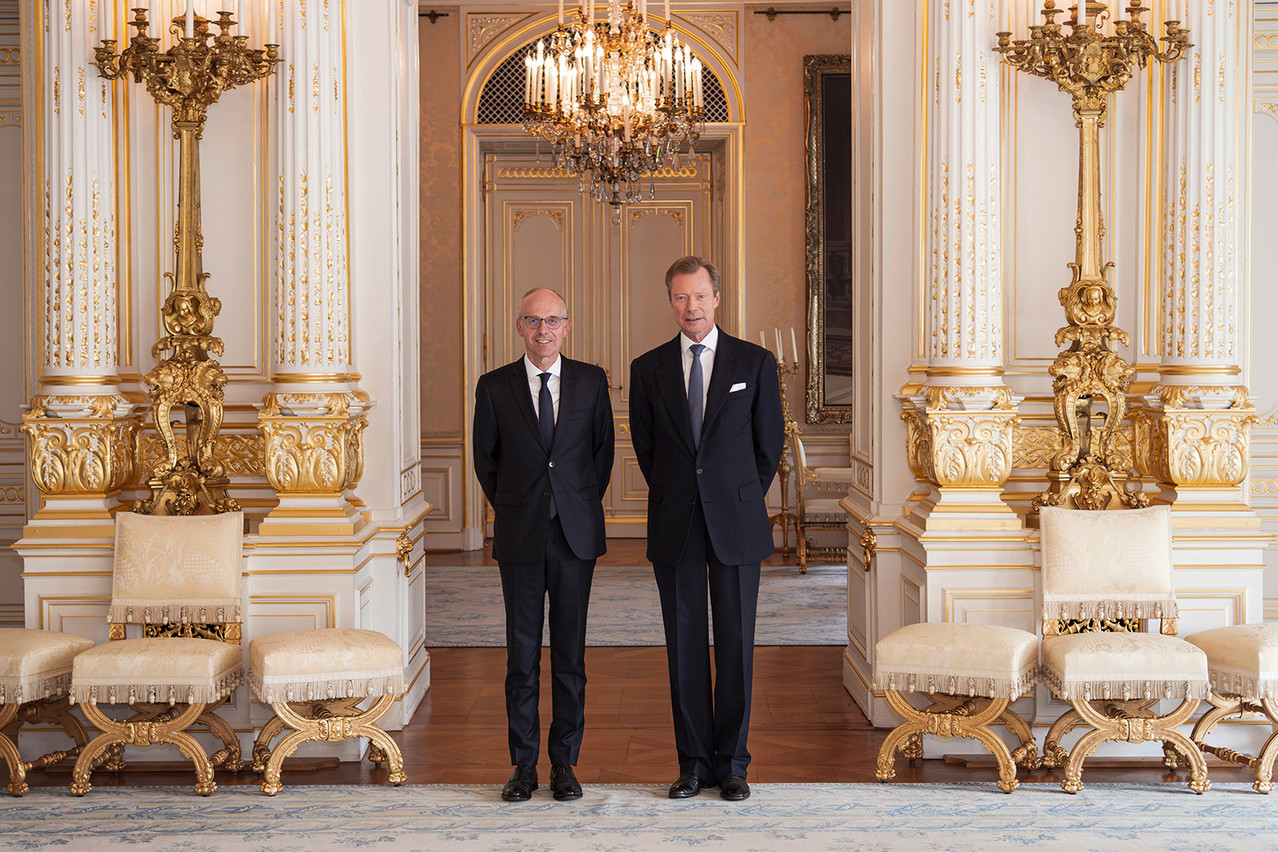 Luc Frieden, the CSV lead candidate, on left, received a mandate to try assembling a coalition government from Grand Duke Henri on 9 October 2023. Photo: Maison du Grand-Cour Grand-Ducale