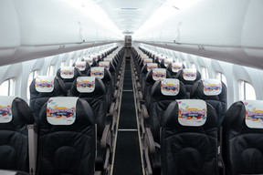 The design also features on the headrest covers on board, in Luxair’s business lounge, and on various advertising materials. (Photo: GSK Stockmann/David Schumacher)