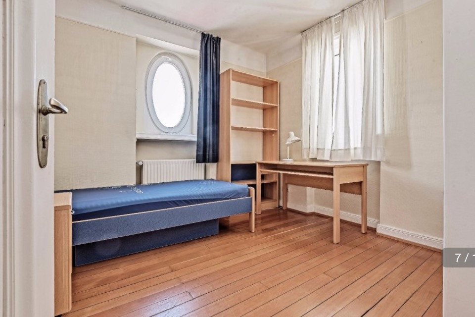 One of the smaller bedrooms, which was used for student housing, seen before renovation work started. Photo provided by Aatika Hayat