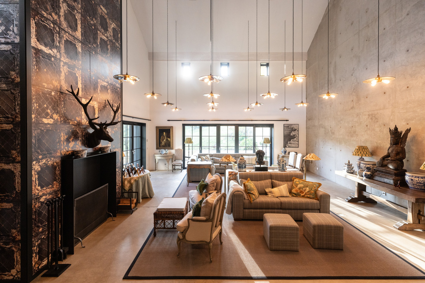 The main living room is a huge open space that reaches right up to the roof. Photo: Guy Wolff/Maison Moderne