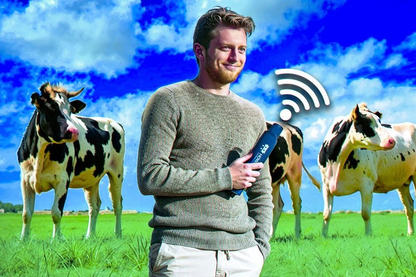 Howcow’s AI-driven devices aim to help farmers track the fertility and health of their cows. Pictured is the startup’s COO, Dmytro Kruhlov. Photo: Howcow