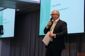Finbarr Browne, CEO of Schroder Investment Management, seen speaking during Alfi’s London conference, 19 October 2023. Photo: ALFI