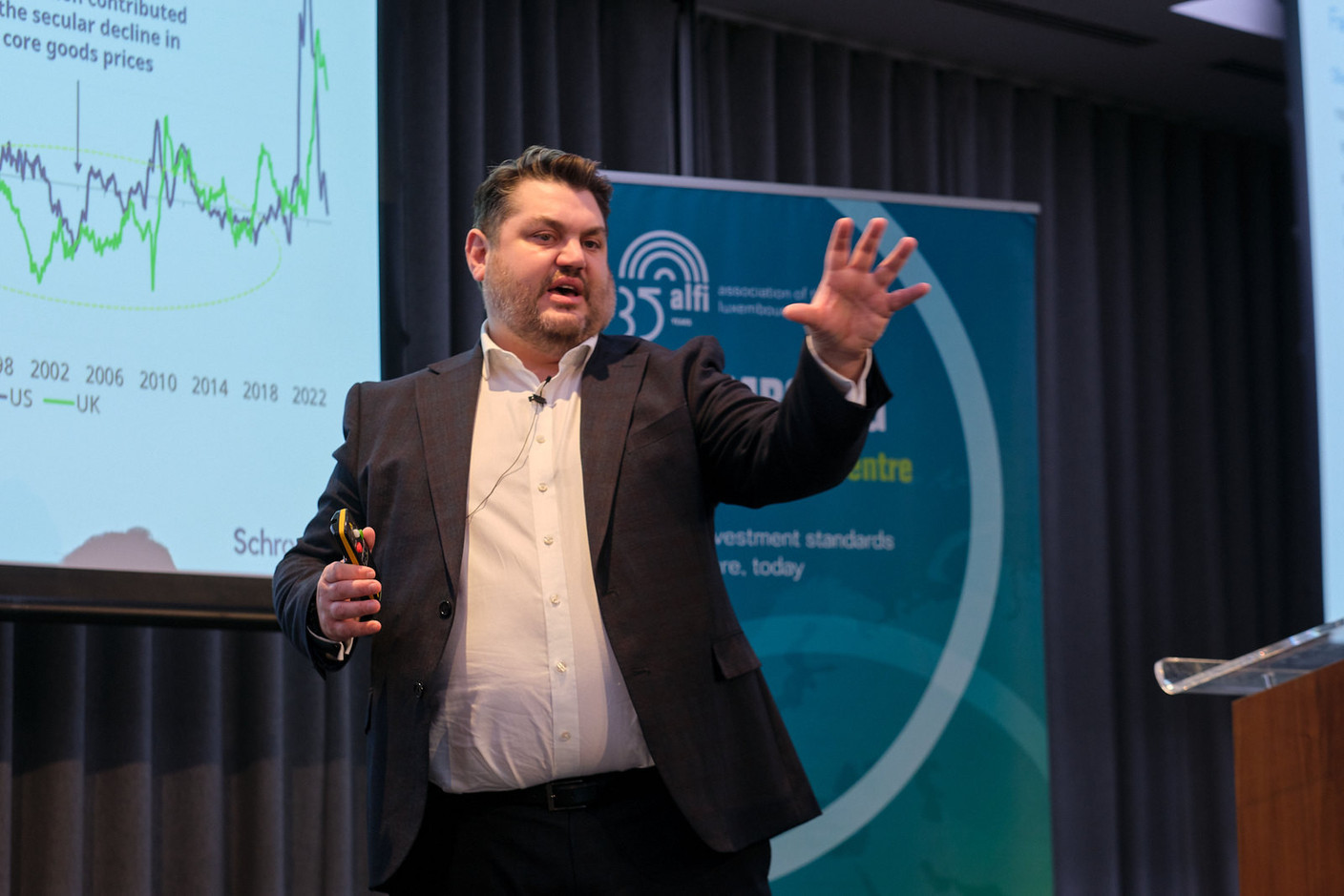 David Rees, senior economist at Schroders, speaks on “Investing into the new era, macro themes that are shaping the investment landscape” at Alfi’s London conference, 19 October 2023. Photo: ALFI
