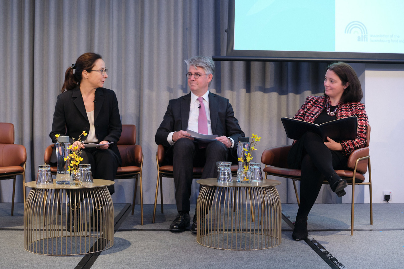 Olivia Moessner, Marco Zwick and Mhairi Jackson on the “Let’s hear from the regulators” panel at Alfi’s London conference, 19 October 2023. Photo: ALFI