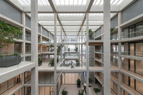 A large atrium connects the two wings. Nigel Young/Foster + Partners
