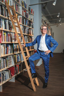A bespoke suit signed by Luxembourg's Eva Ferranti, in blue, "a timeless colour"; white shirt; Crockett & Jones shoes. (Photo: Julian Pierrot/Paperjam)