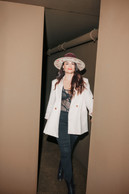 To get ready for the party: cream blazer, contrasted with an Etam bodysuit and a Minime Paris hat by Parisian couturier Marie Marquet. (Photo: Julian Pierrot / Paperjam)