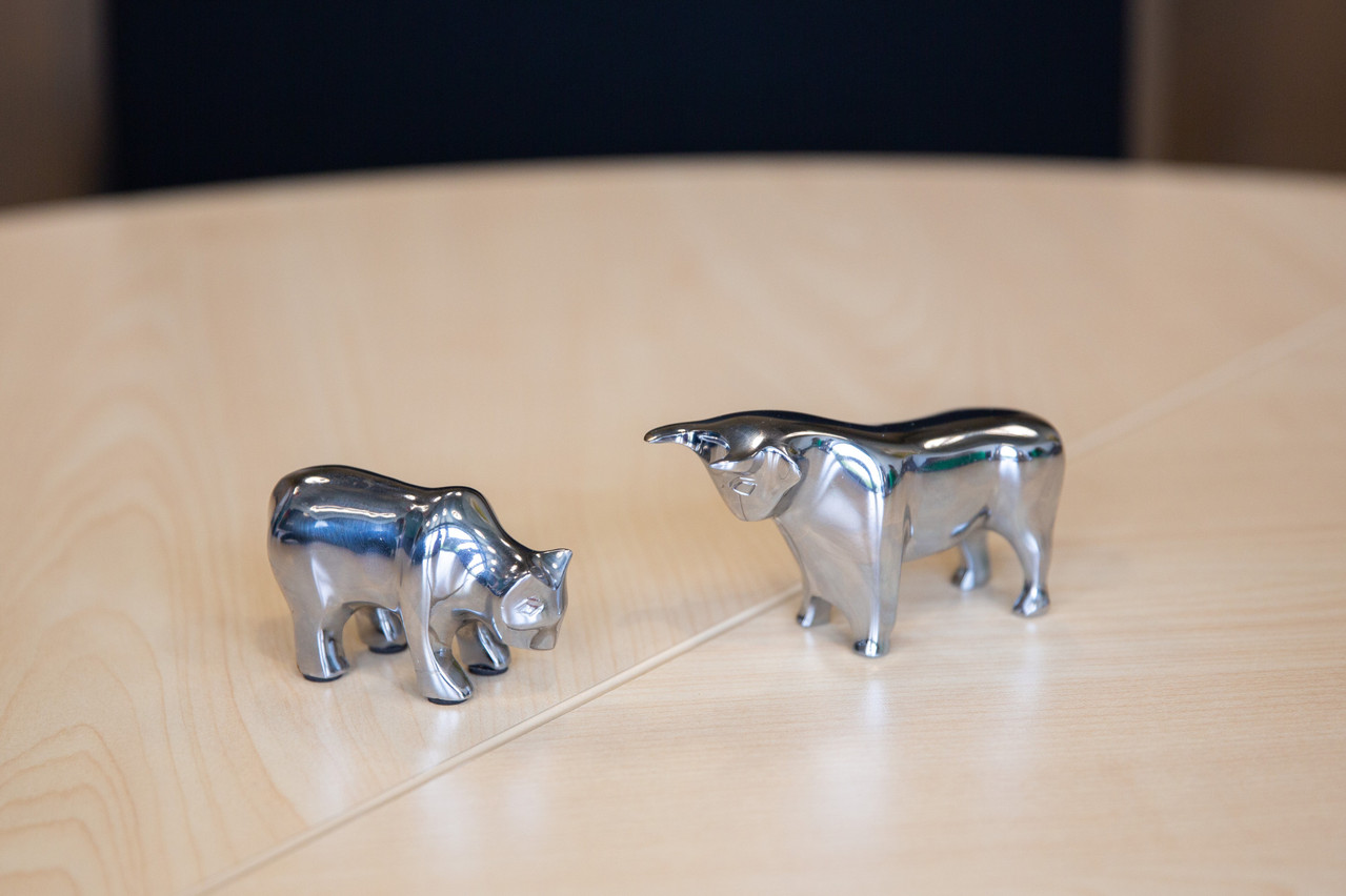No surprise that an investment fund executive would have bear and bull figurines on their desk. Photo: Romain Gamba