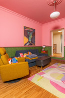 In the living room, even the ceiling has been painted pink. Photo: Eva Krins/Maison Moderne