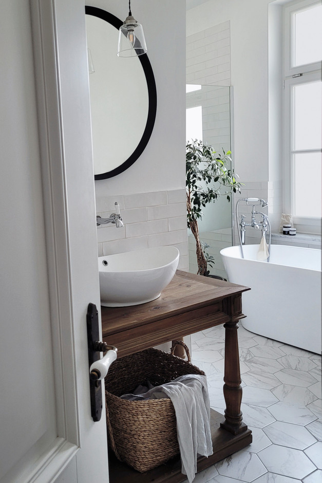 Renovating the bathroom or refreshing the decor are just some of the cost-effective ways to enhance your home, says Henson. Photo: Match Works