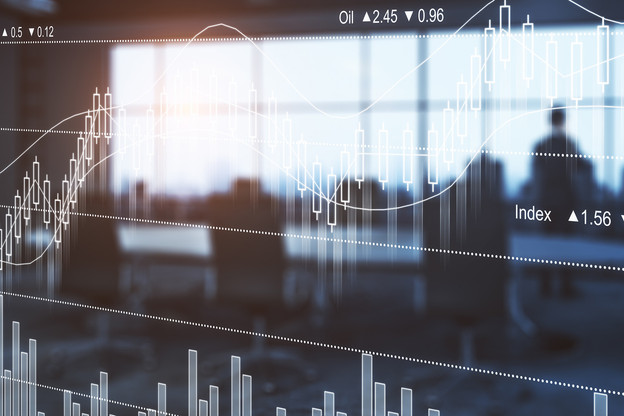Thoughtful businessman in blurry filtered meeting room interior with abstract forex chart. Fund management concept. Double exposure  (Photo: ©peshkov) 