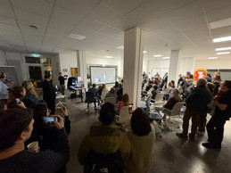 Attendees at Ispace Luxembourg’s HQ applaud the moment a SpaceX rocket carrying Ispace’s lunar lander blasts off, 15 January 2025. Photo: Maison Moderne