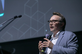Chris Hollifield of Luxembourg for Finance is seen speaking during Deloitte’s digital assets conference, 20 April 2023. Matic Zorman / Maison Moderne