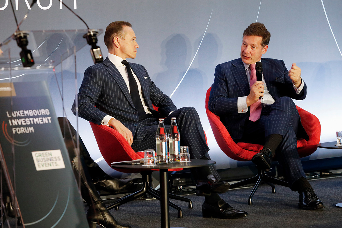 Alain Kinsch and Nicolas Mackel discussed how Luxembourg’s centre has evolved, competitiveness, talent attraction and the grand duchy’s economic model during a panel moderated by Sandrine Pompidou, 27 November 2023. Photo: Indosuez/Olivier Minaire Photography