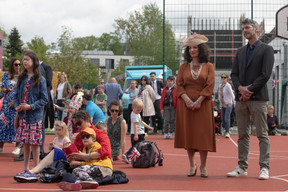 Attendees watching the coronation of King Charles III and Queen Camilla, shown on big screens at St George’s International School on 6 May. Photo: Matic Zorman / Maison Moderne