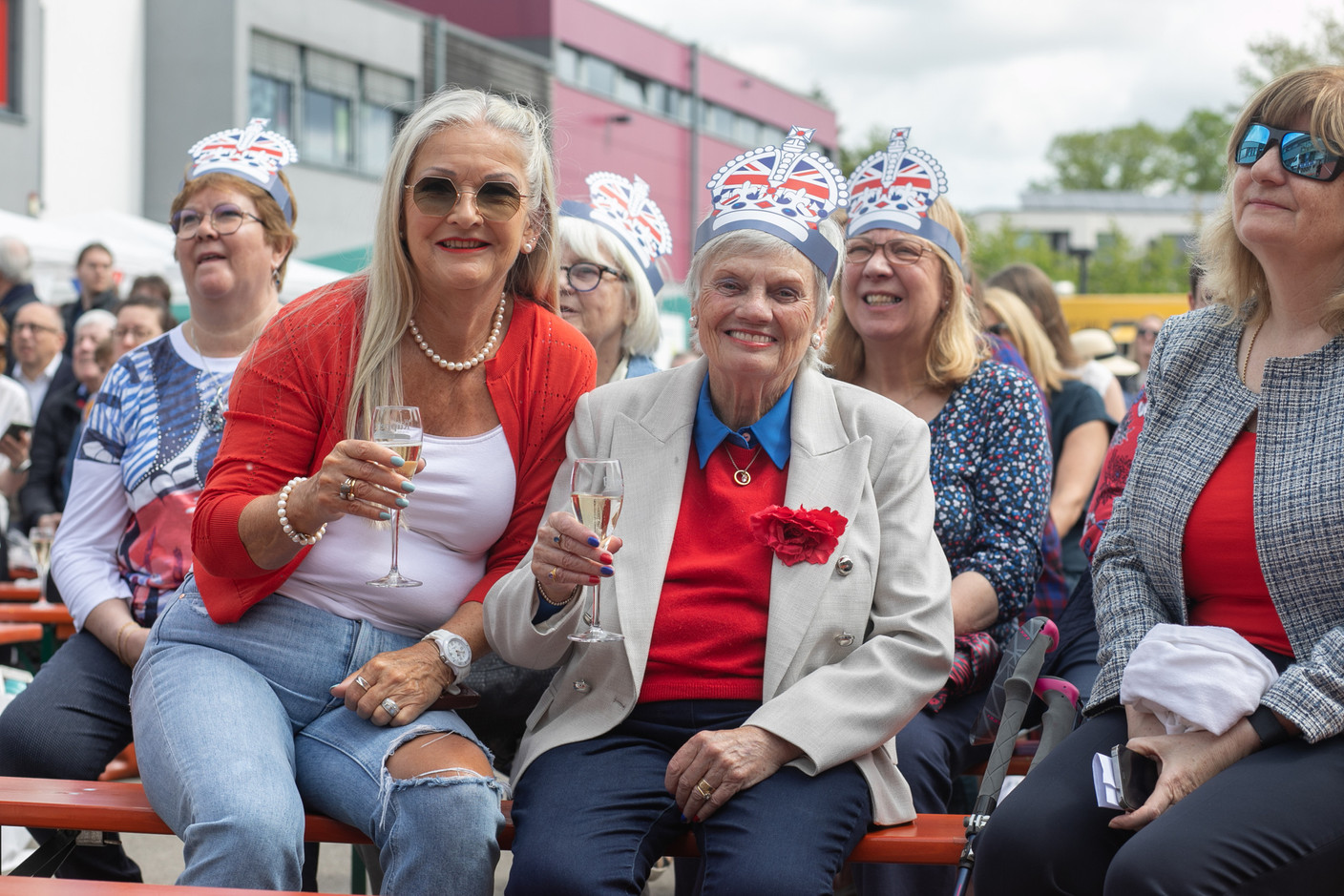 People attending an event at St George’s International School in Luxembourg on 6 May 2023 to celebrate the coronation of King Charles III and Queen Camilla. Photo: Matic Zorman / Maison Moderne