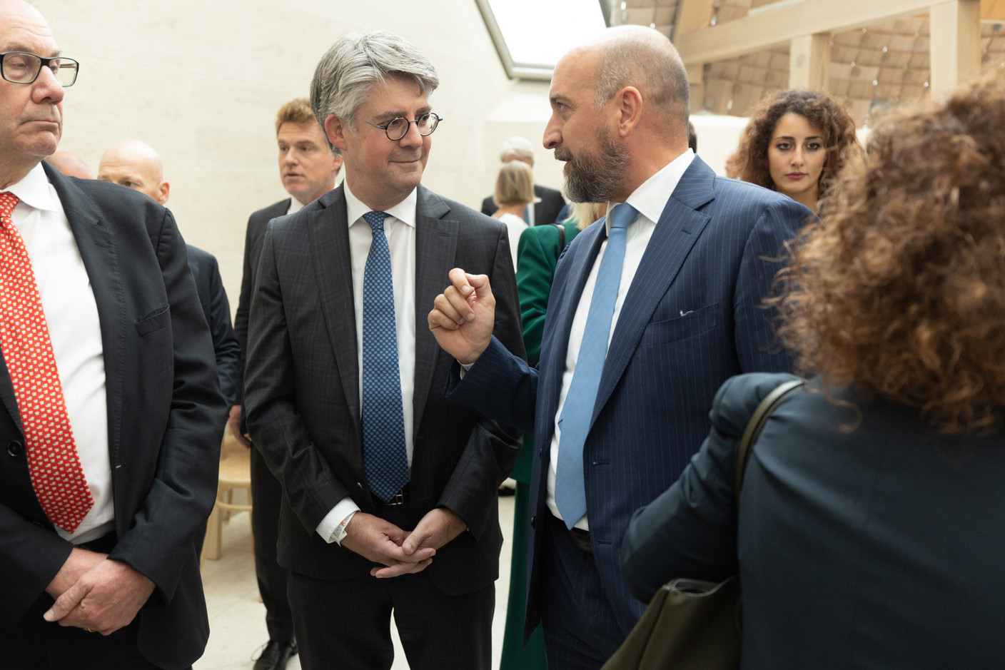 Marco Zwick, director at the Luxembourg financial regulator CSSF and Andrea Gentilini, head of market infrastructures division at the CSSF, are seen during the Luxembourg Financial Markets Association’s 65th anniversary reception, 13 September 2022. Photo: Guy Wolff