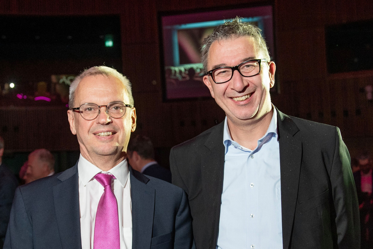 Luxembourg’s insurance industry is experiencing positive growth, especially in life insurance premiums, after three years of subdued performance, Marc Hengen (left), managing director of the Luxembourg Insurance and Reinsurance Association (Aca), said on Friday, 22 November 2024. Hengen is pictured alongside Christian Strasser, chairman of the Aca board of directors, at the Aca Insurance Day event. Photo: Aca