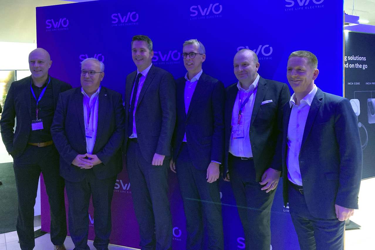 Representatives of Losch and Socom flank ministers Lex Delles (DP) and Léon Gloden (CSV) at the launch of Swio. Photo: Emilio Naud/Maison Moderne